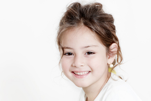 Smiling Girl With Healthy Teeth